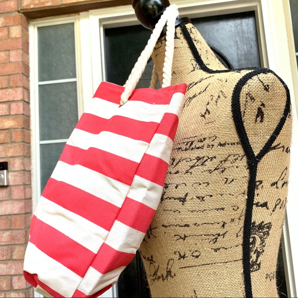 Corral and White stripped tote, with rope handles.